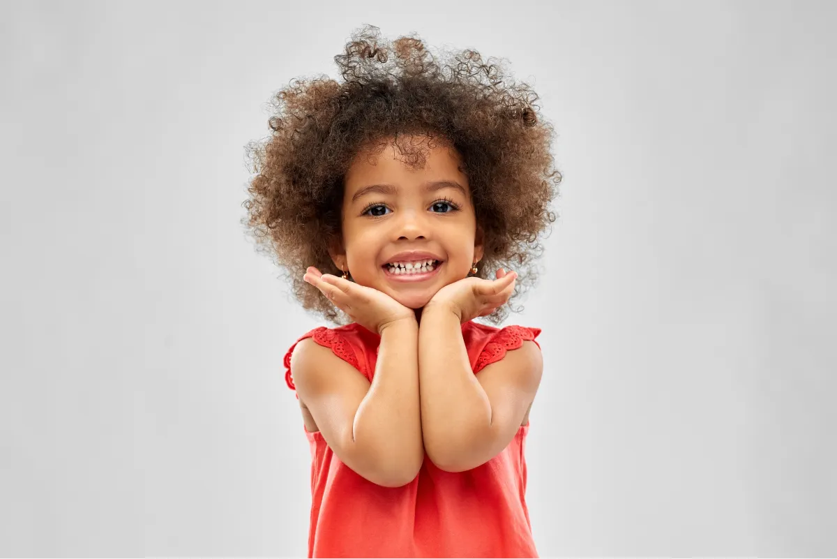 Happy child posing with a bright smile